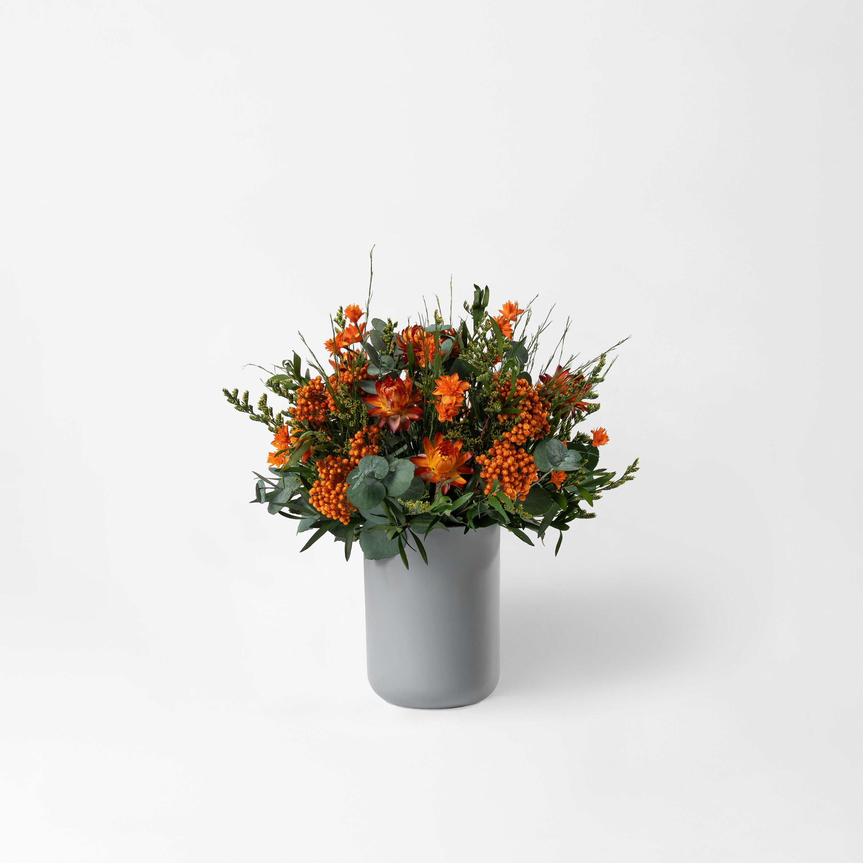 PRESERVED ORANGE WILD MIXED FLOWER ARRANGEMENT IN GREY BAMBOO VASE FOR YACHTS