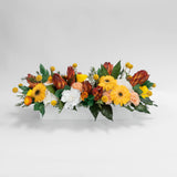 Preserved orange and yellow tropical long low flower arrangement for yachts 