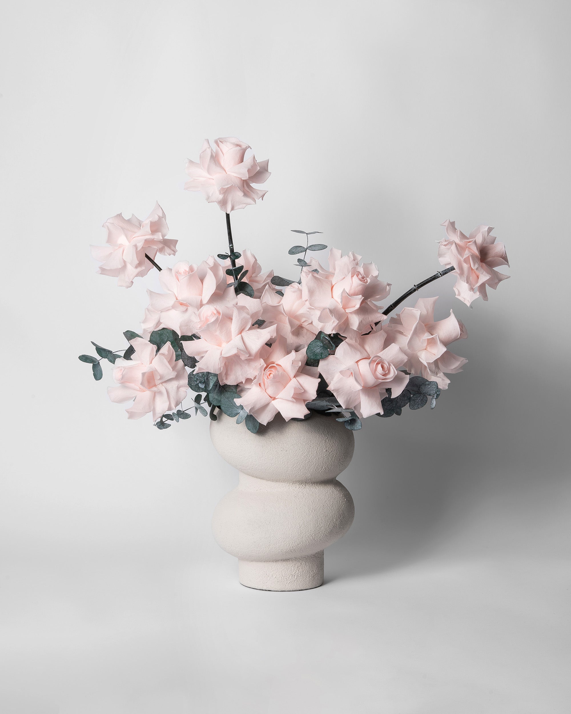 Preserved pink reflexed roses with eucalyptus 