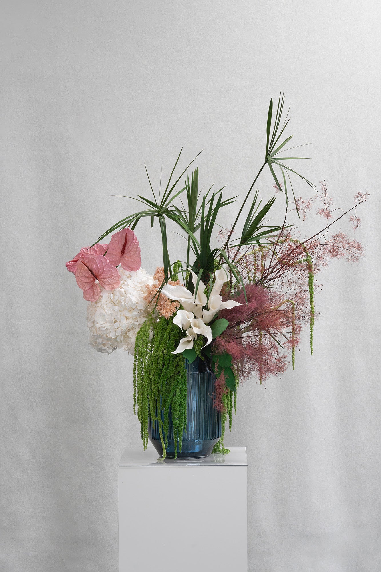 Preserved tropical mixed flowers arrangement in vase