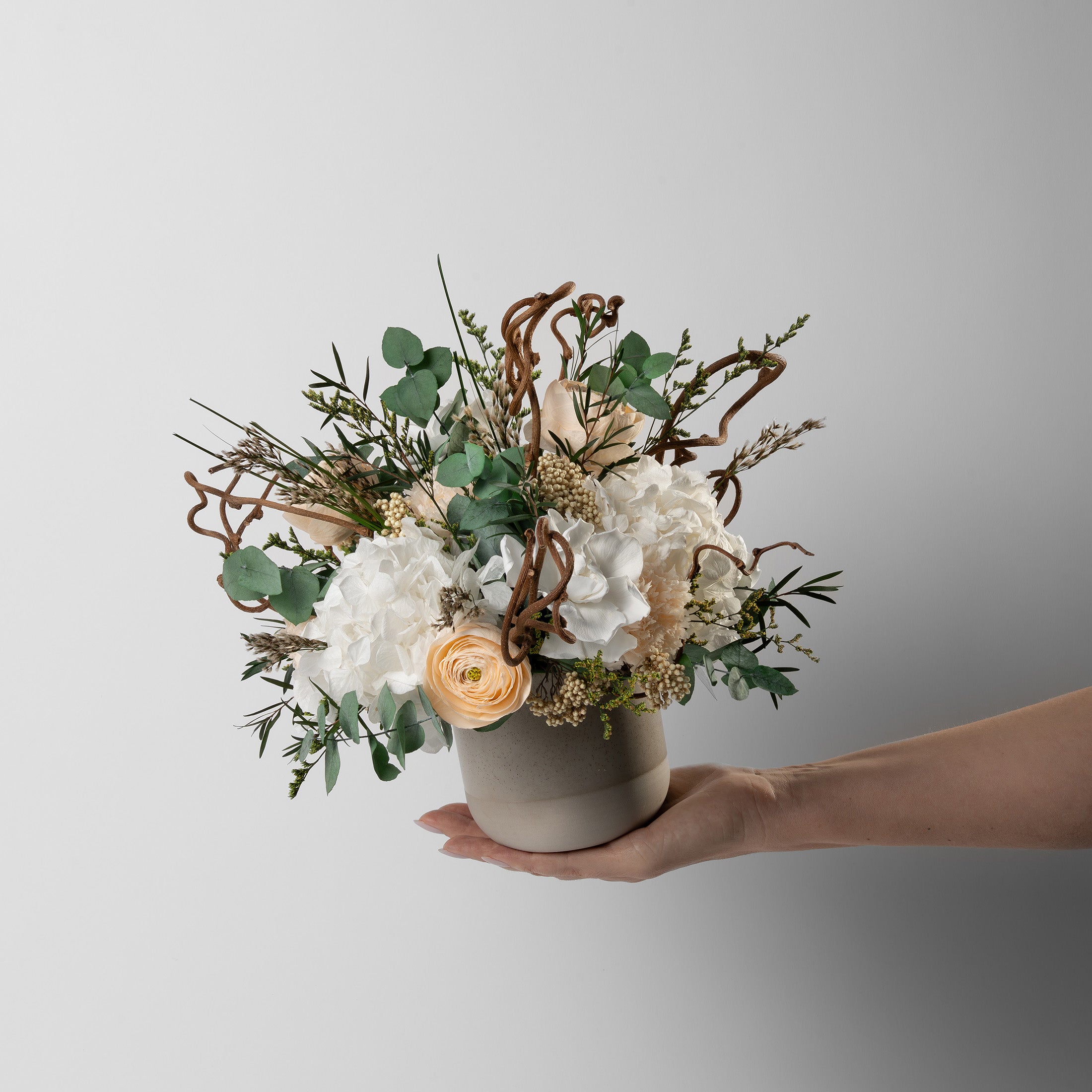 PRESERVED WHITE AND PEACH WILD MIXED FLOWER ARRANGEMENT IN STONE VASE FOR YACHTS