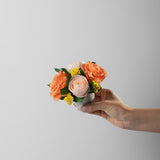 preserved orange and peach flower arrangement for yachts 