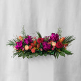 Preserved purple, green and red tropical long low tray flower arrangement for yachts 