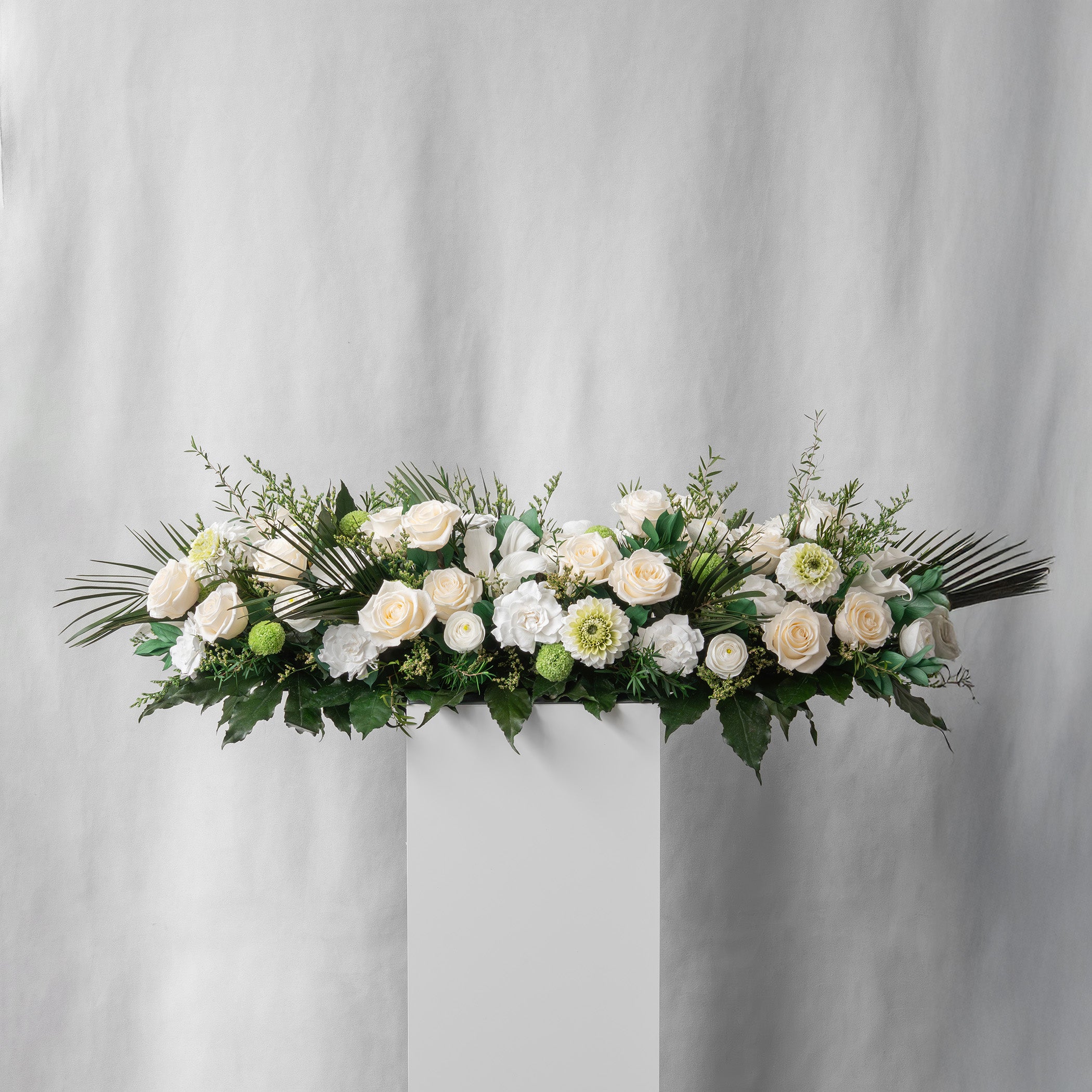 Preserved white and green tropical long low tray flower arrangement for yachts 