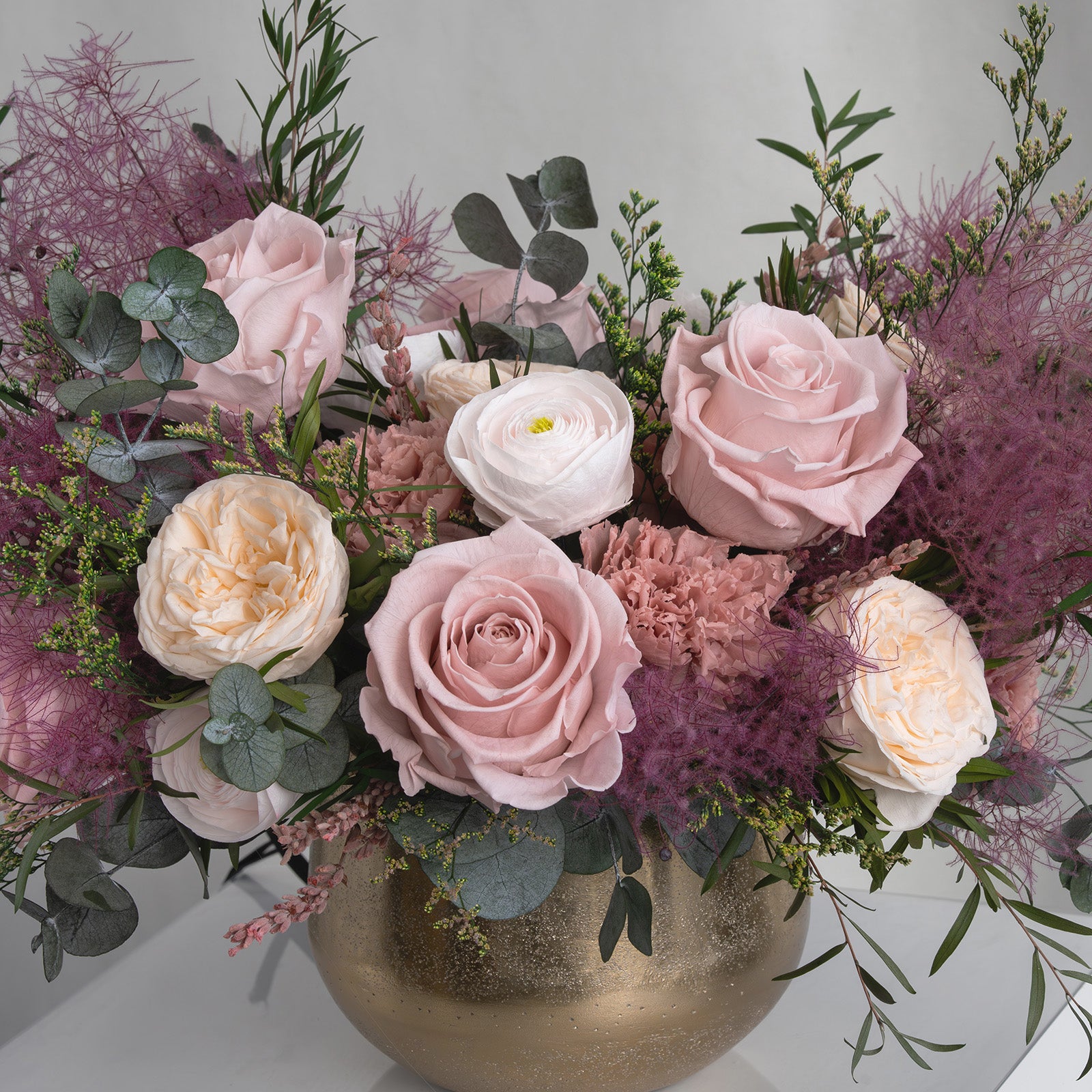 Preserved purple, dusty and cream mixed flower arrangement for yachts