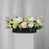 Preserved yellow, green and white tropical long low flower arrangement for yachts 