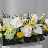 Preserved yellow, green and white tropical long low flower arrangement for yachts 