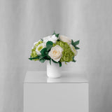Preserved green and cream mixed tropical flower arrangement for yachts