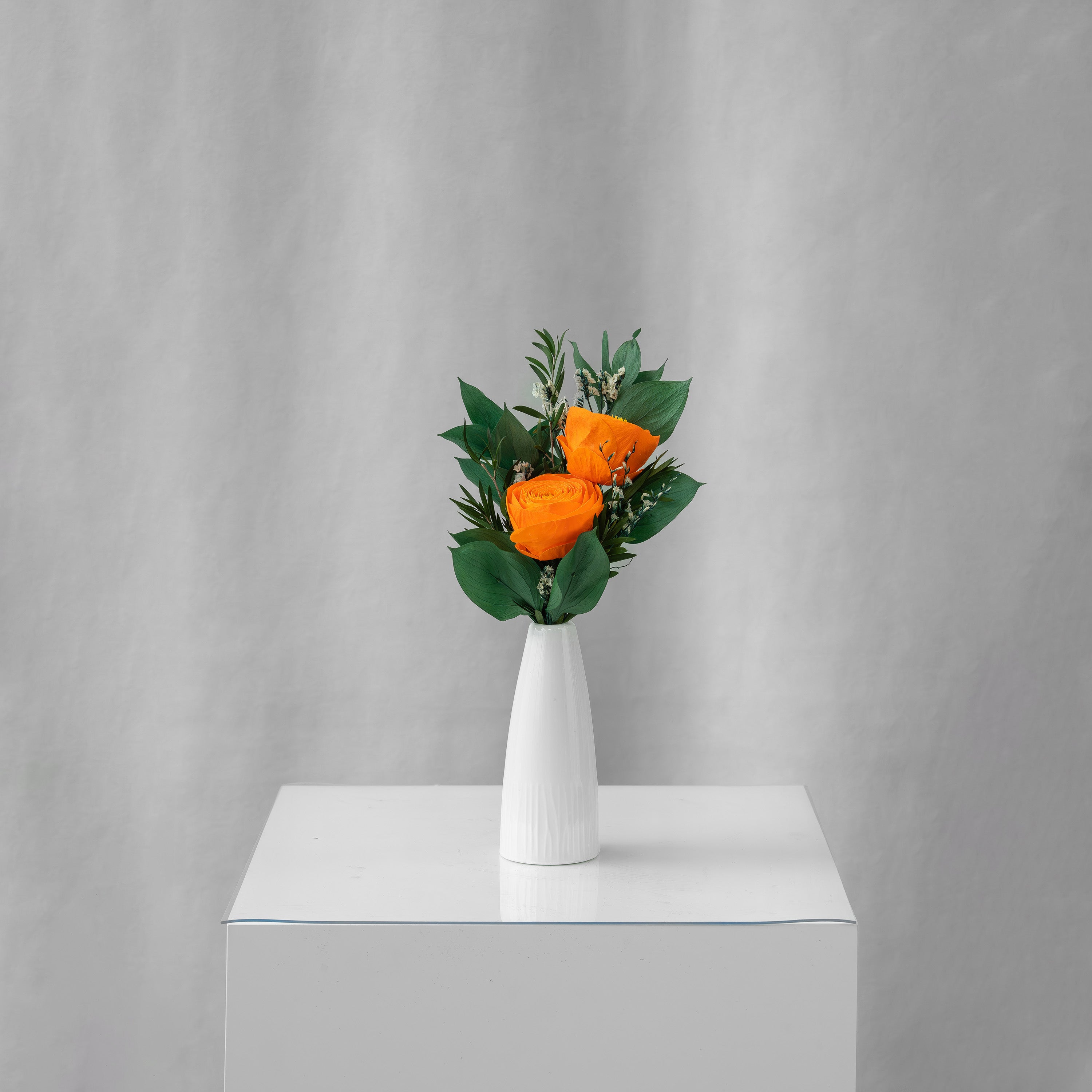 Preserved orange tropical flower arrangement for yachts