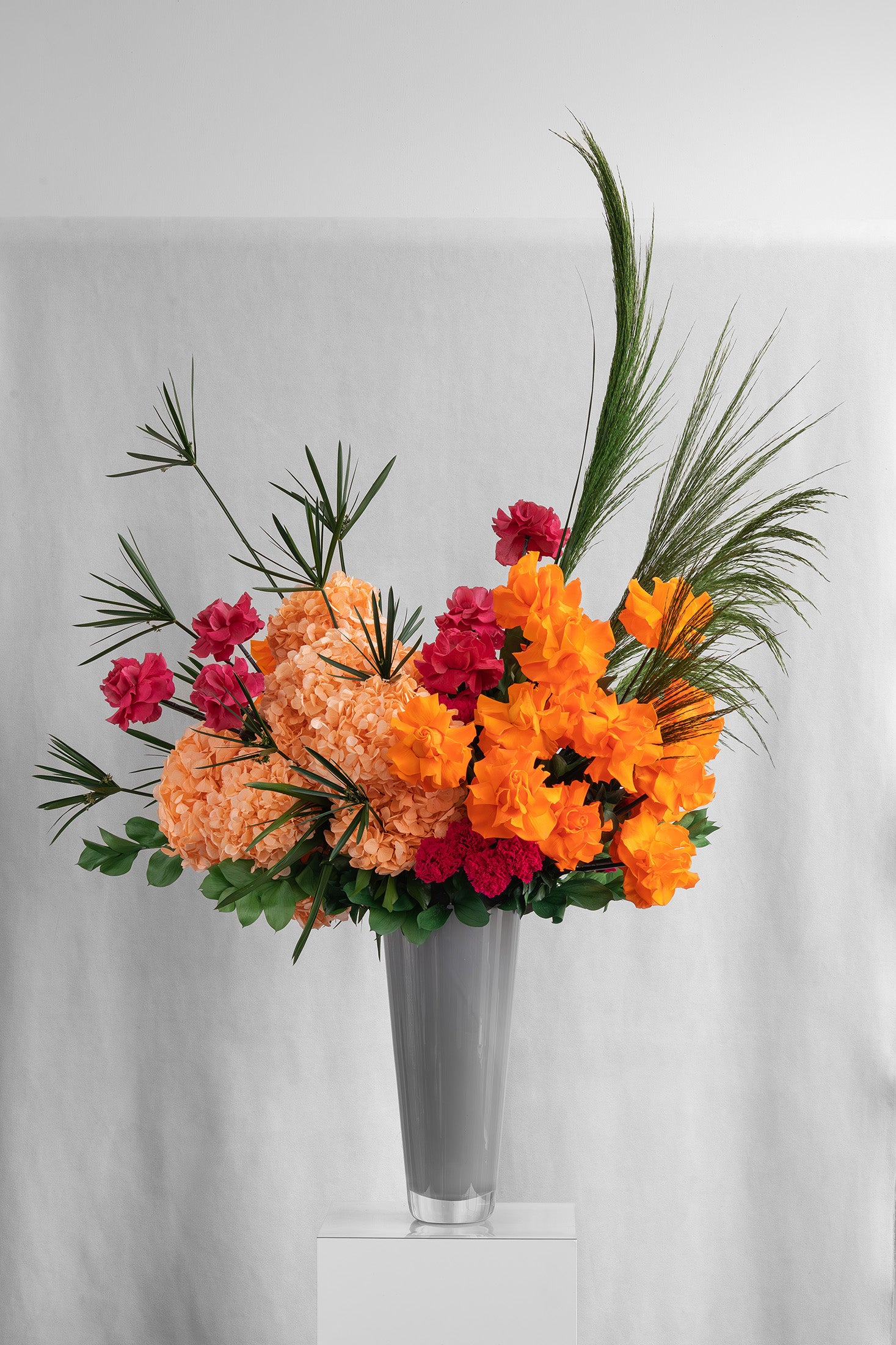 Preserved orange tropical flower arrangement