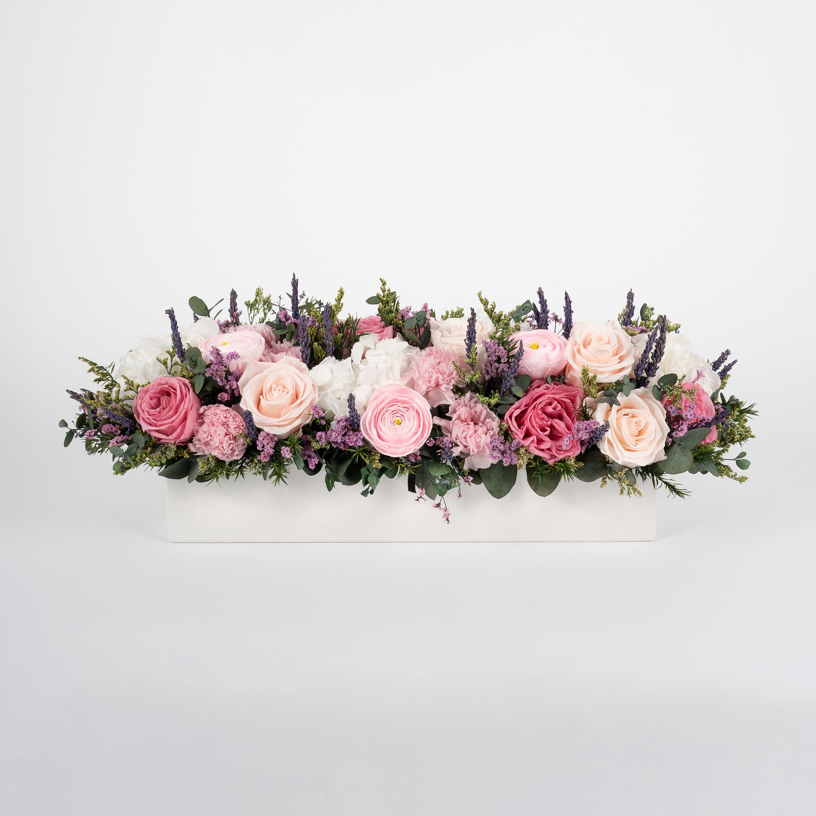 Preserved pink and blush long low flower arrangement for yachts 