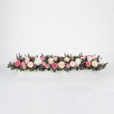 Preserved pink and blush long low flower arrangement for yachts 