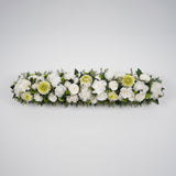 Preserved green and white tropical long low flower arrangement for yachts 