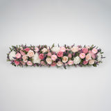 Preserved pink and blush long low flower arrangement for yachts 