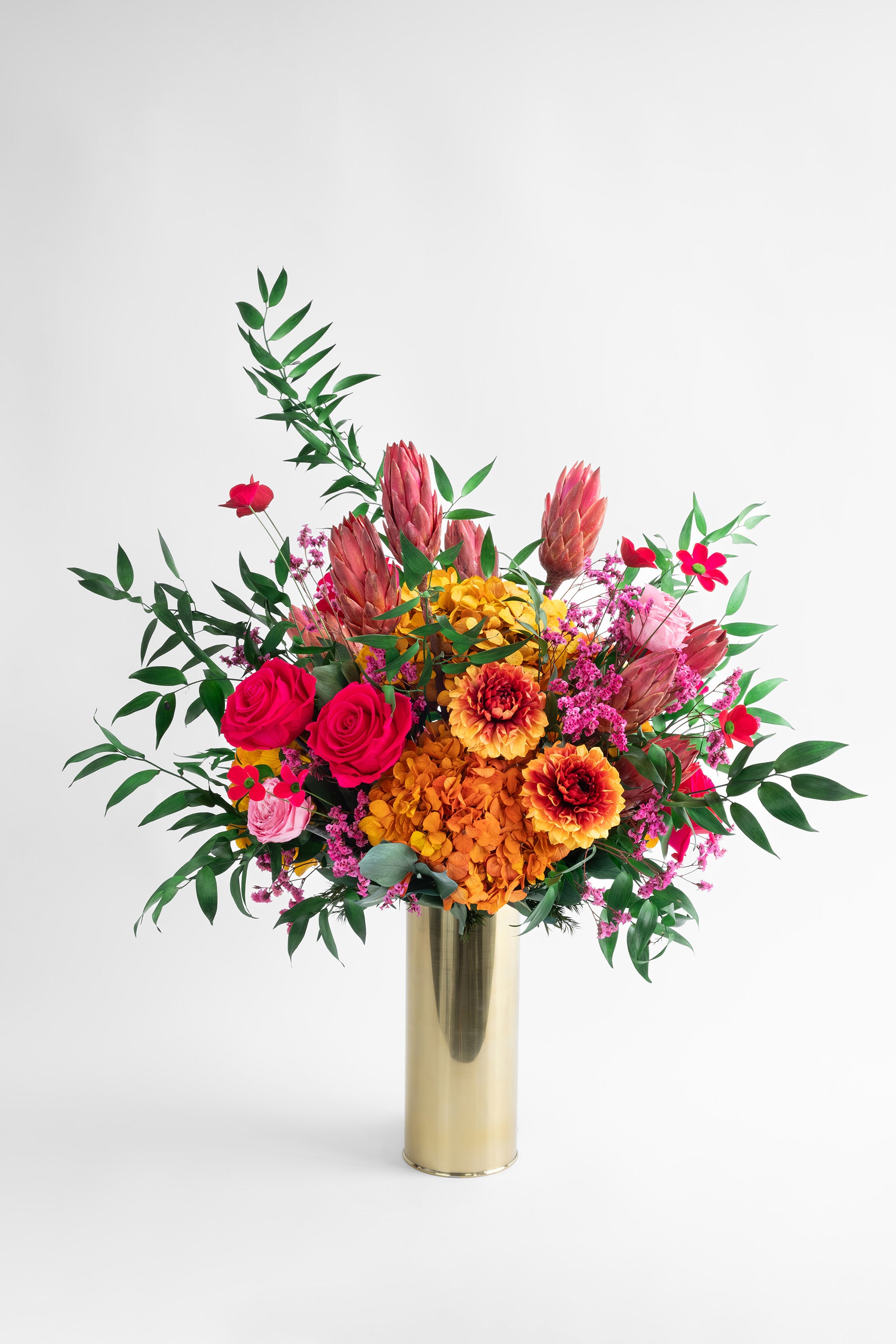 Preserved orange tropical flower arrangement