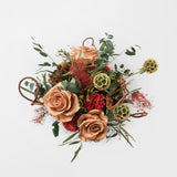 Preserved green and toffee floral arrangement in a ceramic vase for yachts interior. 