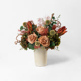 Bouquet of toffee and green mix preserved flowers in a ceramic vase for yachts