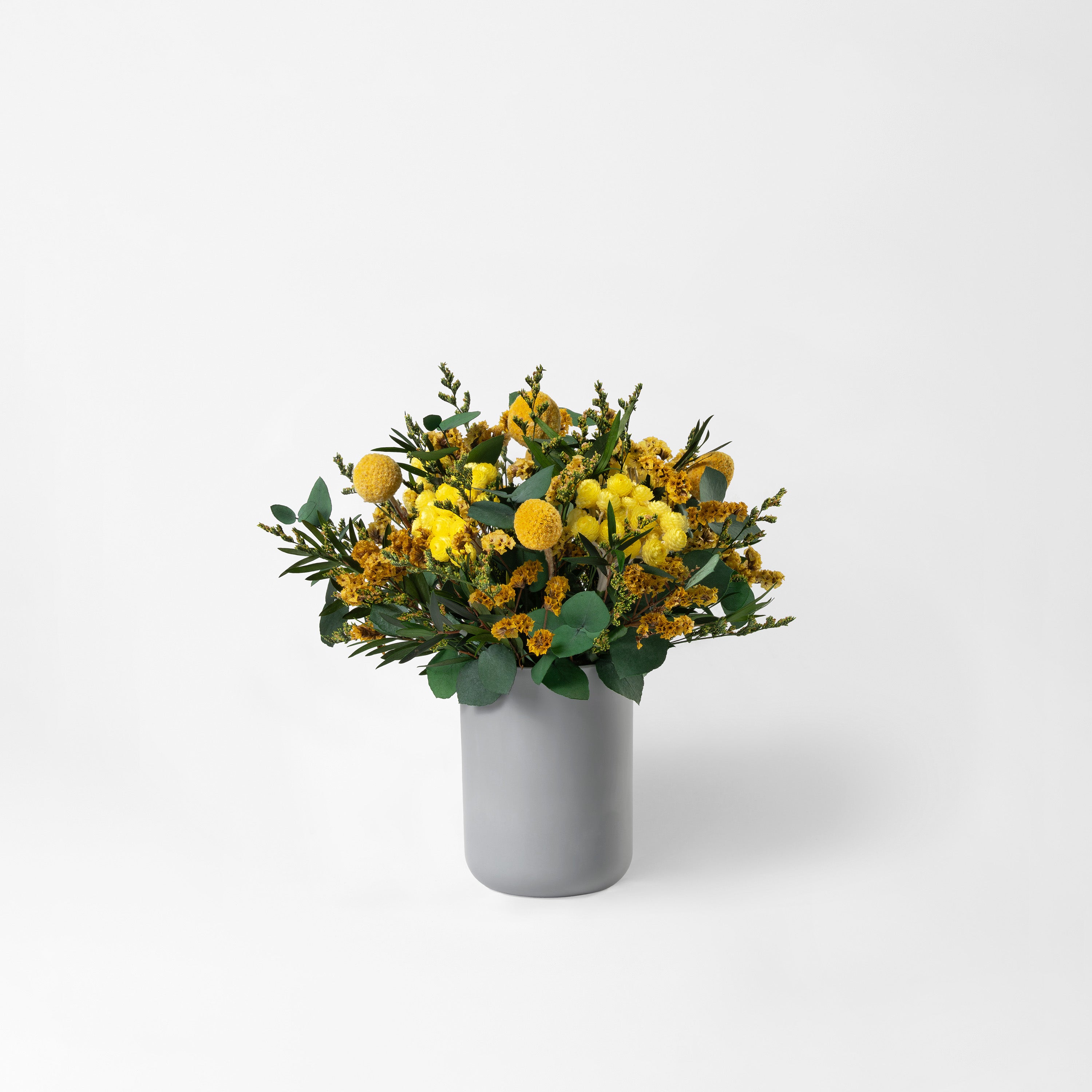PRESERVED YELLOW WILD MIXED FLOWER ARRANGEMENT IN GREY BAMBOO VASE