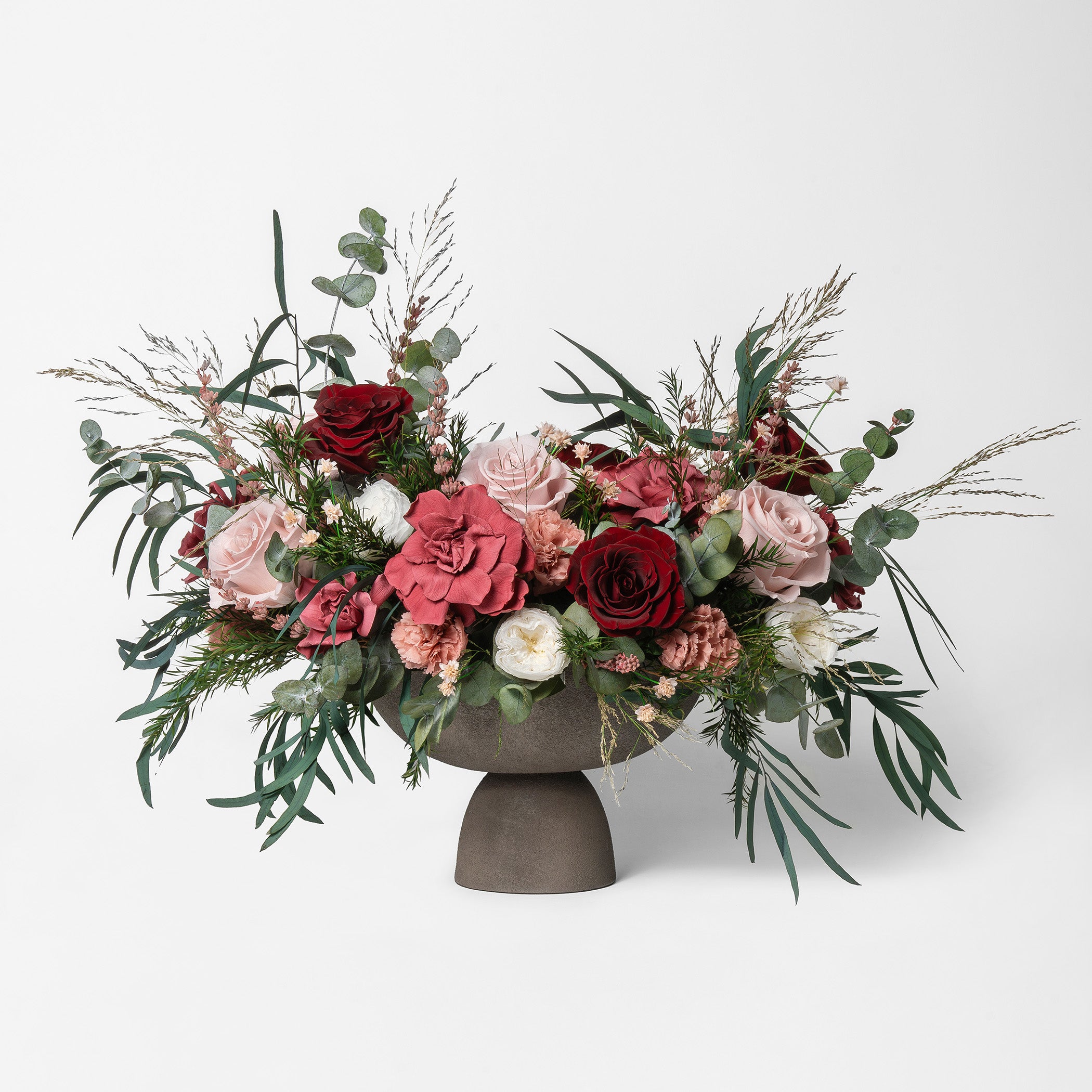 PRESERVED BURGUNDY & CHERRY MIXED FLOWER ARRANGEMENT IN GREY FOOTED VASE FOR YACHTS
